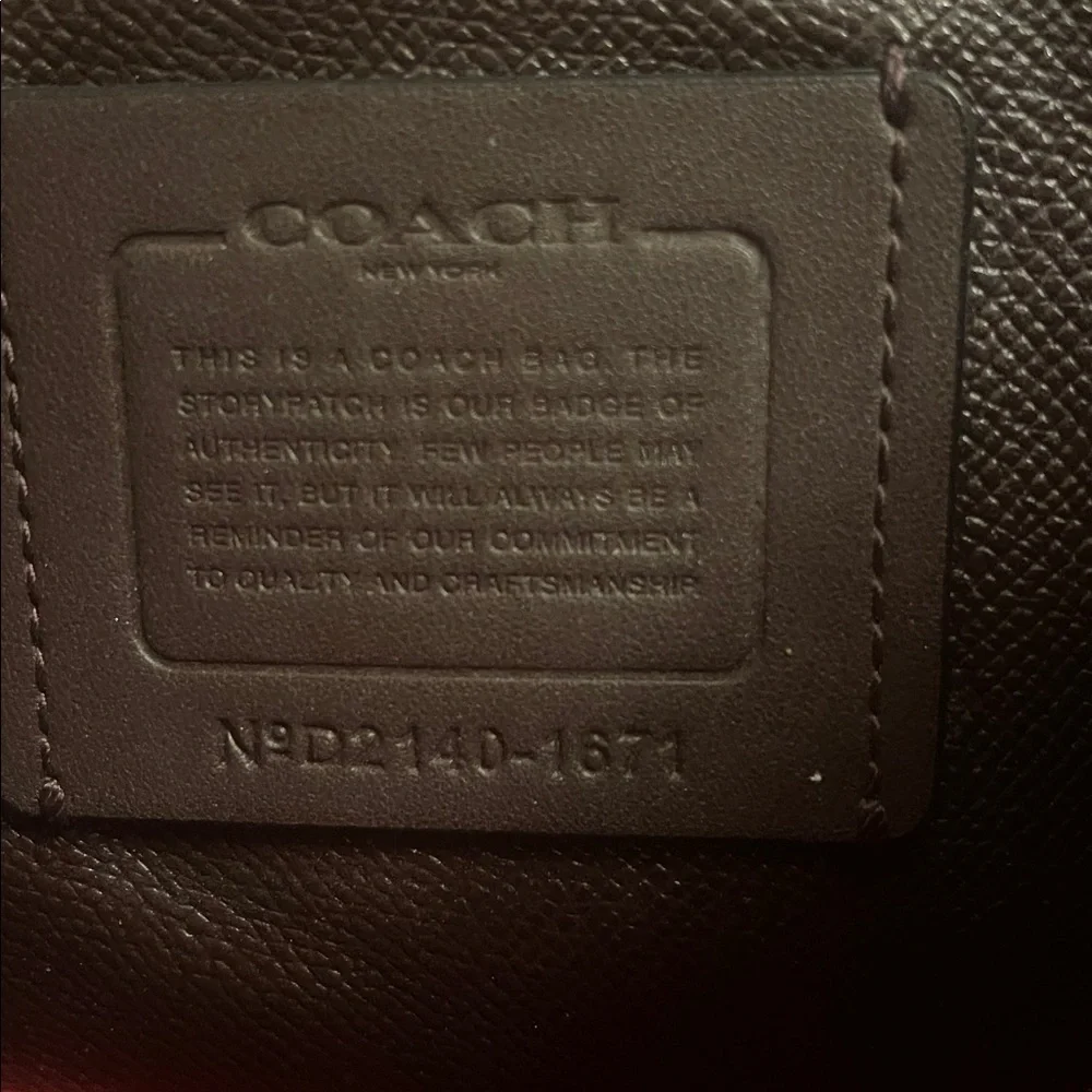 Coach Black Leather Tote Bag with Red Interior